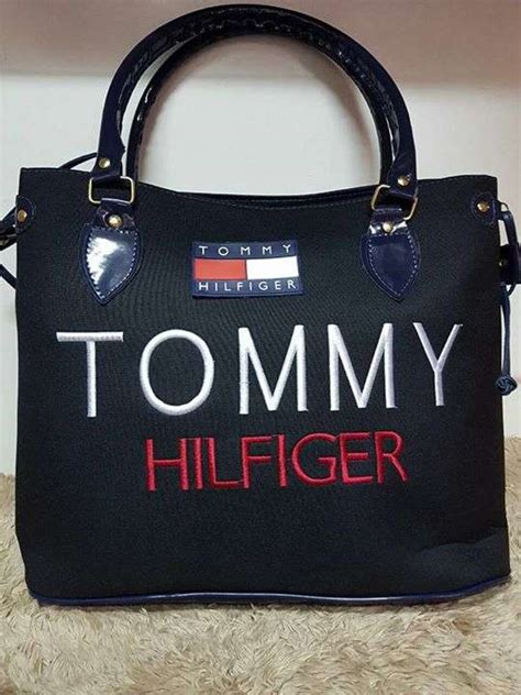 tommy carteras online.